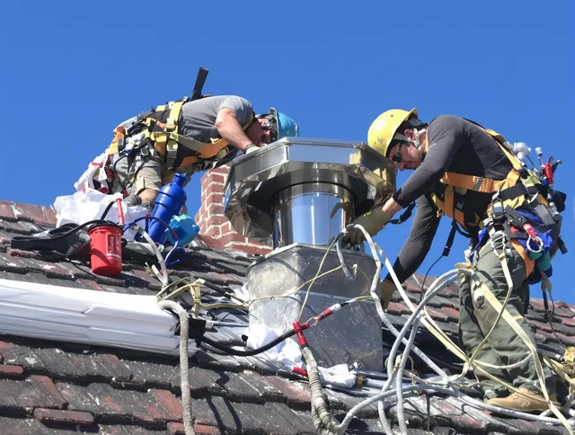 Protective chimney cap installed by Shelton Chimney Sweep in Shelton, CT