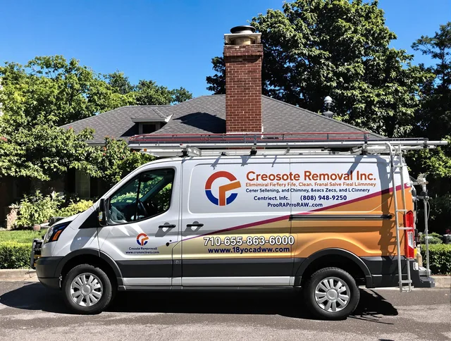 Shelton Chimney Sweep technician removing creosote safely in Shelton, CT